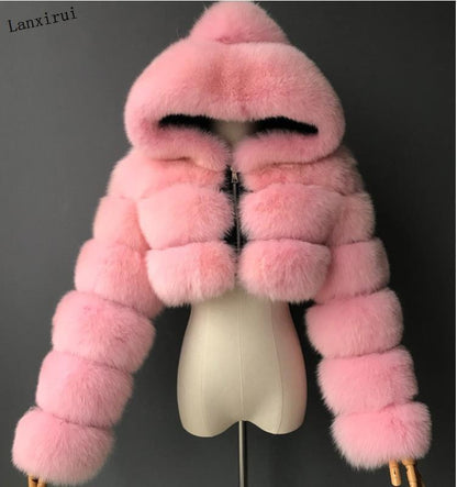 Manteau court en fausse fourrure à capuche